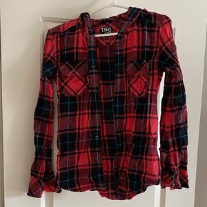 TNA Women’s pink and black flannel. Boyfriend fit, scalloped hem with hood.